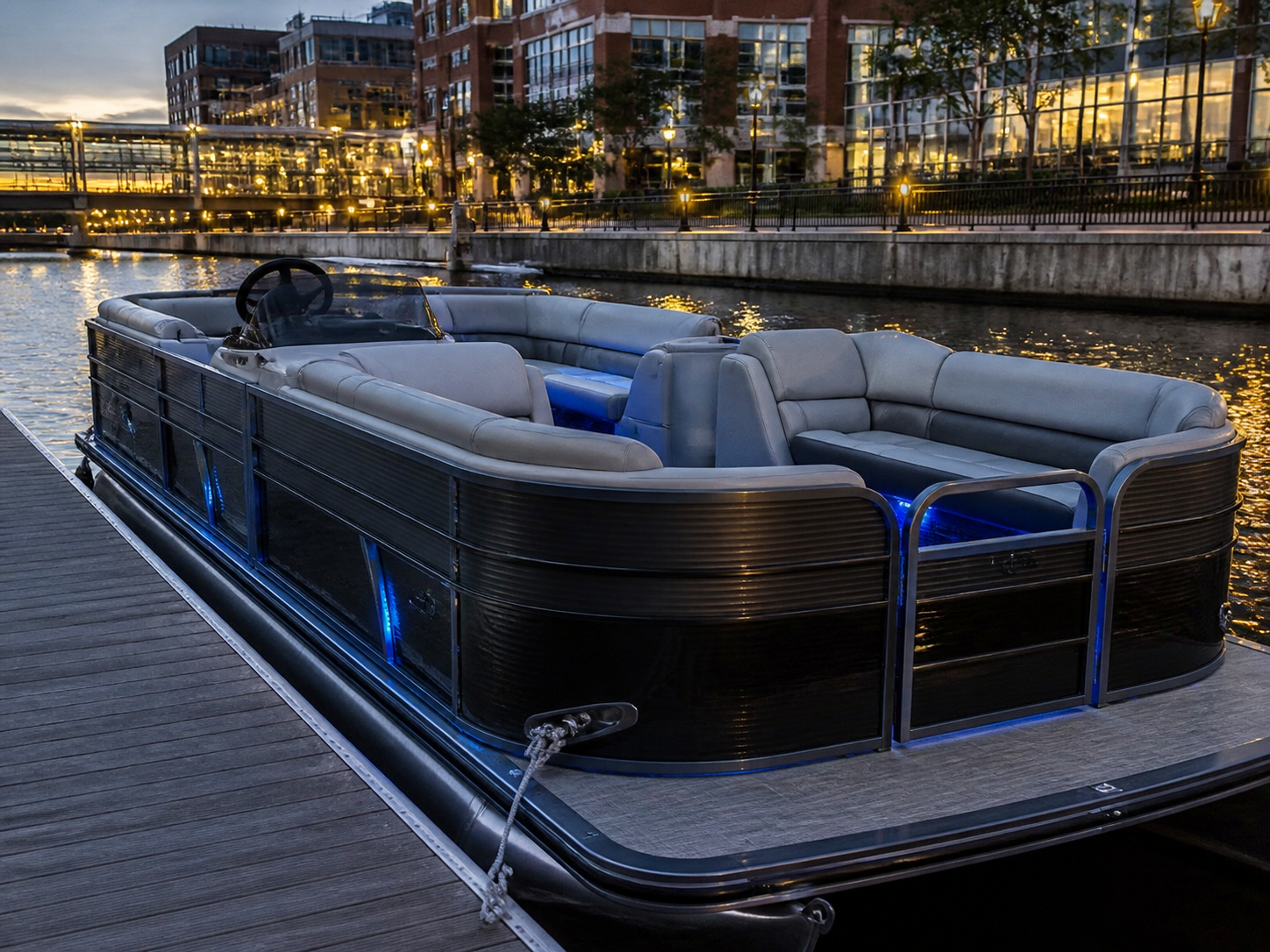 Pontoon boat waiting at a Milwaukee riverfront dock
